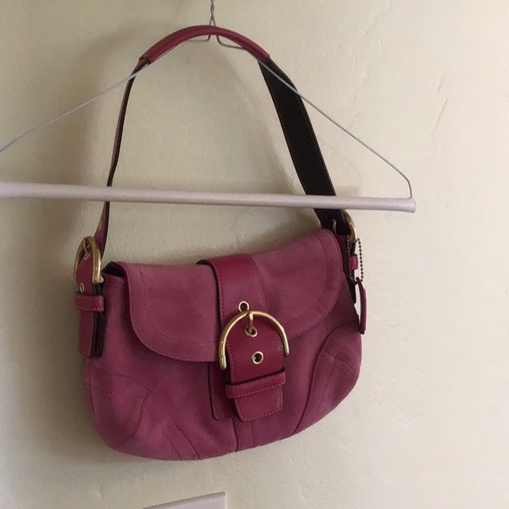 Small pink suede coach bag